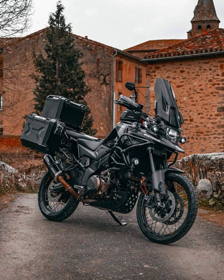 Adventure motorcycle parked on a stone street